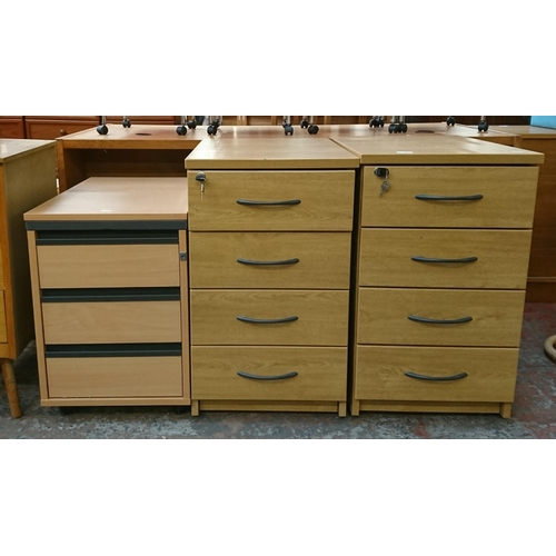 167 - Three office filing cabinets, two oak effect four drawer and one beech effect three drawer