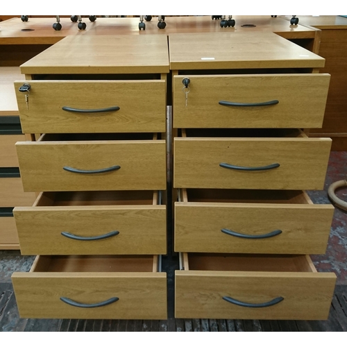 167 - Three office filing cabinets, two oak effect four drawer and one beech effect three drawer