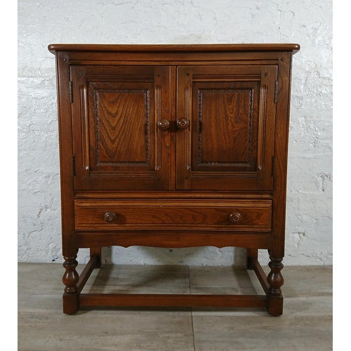 171 - An Ercol Golden Dawn elm credence cupboard/side cabinet - approx. 88cm high x 79cm wide x 42cm deep