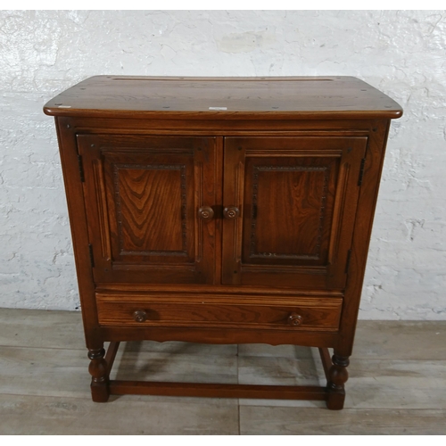 171 - An Ercol Golden Dawn elm credence cupboard/side cabinet - approx. 88cm high x 79cm wide x 42cm deep