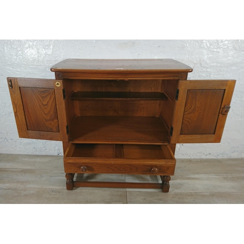 171 - An Ercol Golden Dawn elm credence cupboard/side cabinet - approx. 88cm high x 79cm wide x 42cm deep