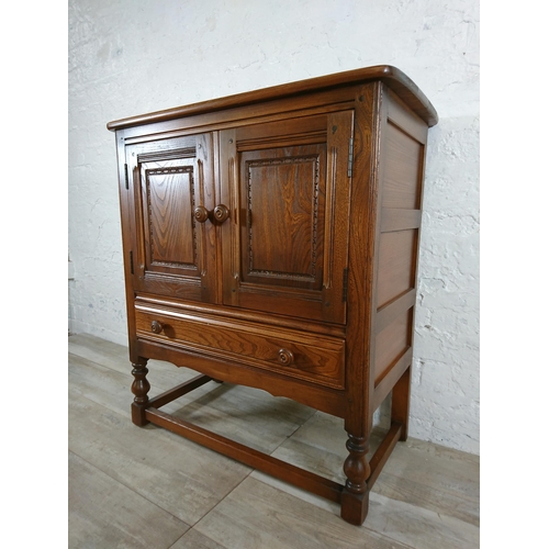 171 - An Ercol Golden Dawn elm credence cupboard/side cabinet - approx. 88cm high x 79cm wide x 42cm deep