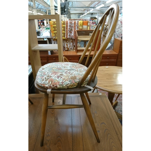 173 - An Ercol Golden Dawn elm draw leaf dining table and four Fleur De Lys chairs - table approx. 75cm hi... 