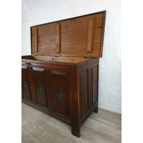 178 - An 18th century and later carved oak four panel coffer - approx. 74cm high x 131cm wide x 49cm deep