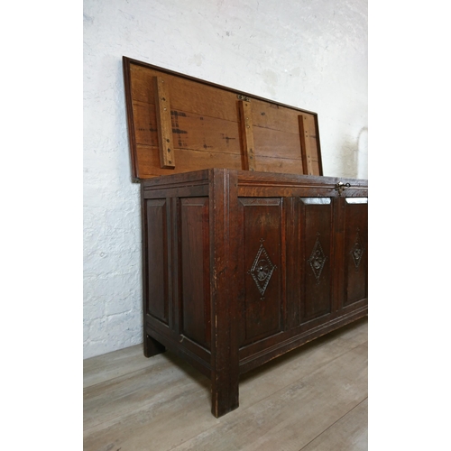 178 - An 18th century and later carved oak four panel coffer - approx. 74cm high x 131cm wide x 49cm deep