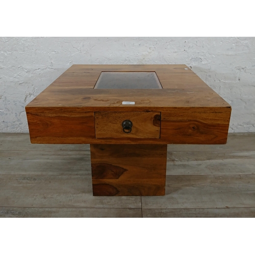 179 - An Indian sheesham wood pebble coffee table - approx. 46cm high x 60cm wide x 60cm deep