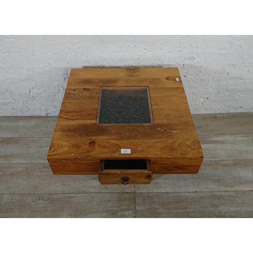 179 - An Indian sheesham wood pebble coffee table - approx. 46cm high x 60cm wide x 60cm deep