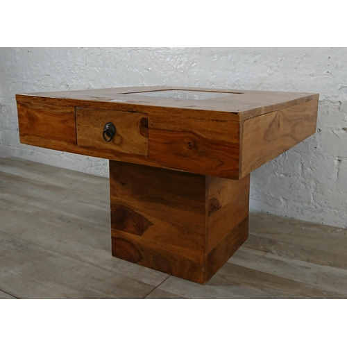 179 - An Indian sheesham wood pebble coffee table - approx. 46cm high x 60cm wide x 60cm deep