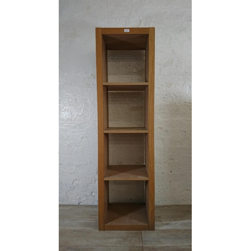 181 - A modern oak effect four tier bookcase - approx. 156cm high x 44cm wide x 36cm deep