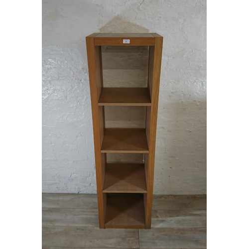 181 - A modern oak effect four tier bookcase - approx. 156cm high x 44cm wide x 36cm deep