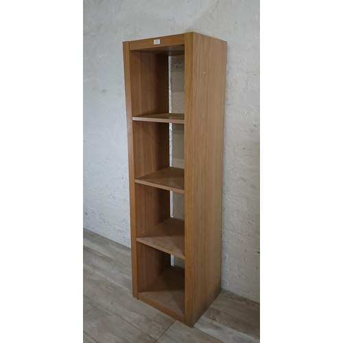 181 - A modern oak effect four tier bookcase - approx. 156cm high x 44cm wide x 36cm deep