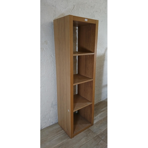 181 - A modern oak effect four tier bookcase - approx. 156cm high x 44cm wide x 36cm deep