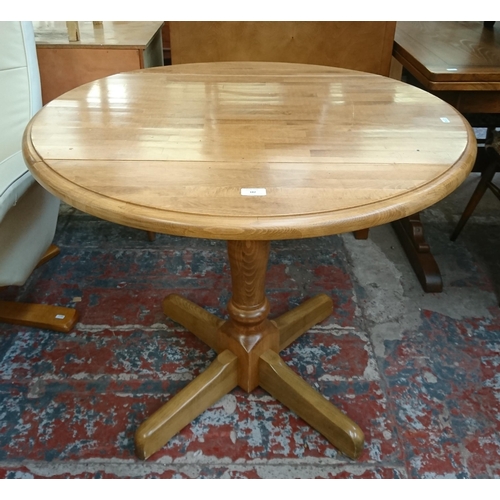 182 - Four pieces of furniture, three Ercol Windsor blonde elm dining chairs and one beech circular pedest... 