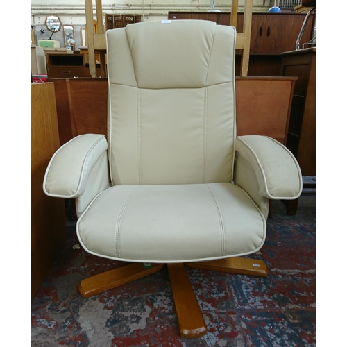 183 - A Stressless style cream leather and bentwood swivel reclining armchair