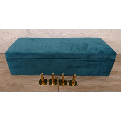 186 - A modern teal fabric upholstered blanket box on gilt metal supports - approx. 29cm high x 109cm wide... 