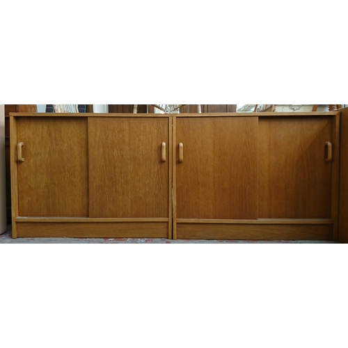 187 - Two mid/late 20th century oak two door office cabinets - approx. 72cm high x 91cm wide x 46cm deep