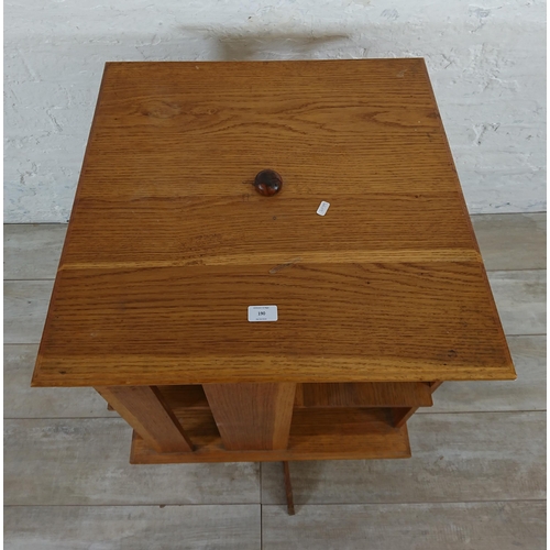 190 - A mid 20th century oak revolving bookcase - approx. 75cm high x 59cm wide x 59cm deep