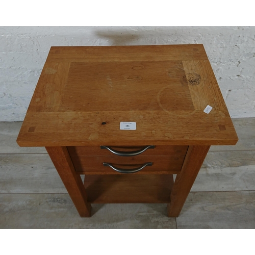 191 - A modern oak two drawer side table - approx. 65cm high x 50cm wide x 35cm deep