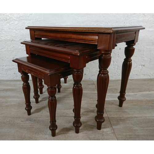 192 - A 19th century style mahogany nest of tables - approx. 55cm high x 67cm wide x 39cm deep