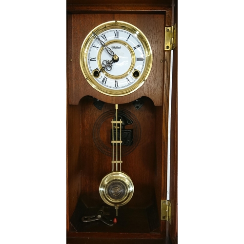 194 - Six items, one Highlands oak cased chiming wall clock with pendulum and key and five various mirrors