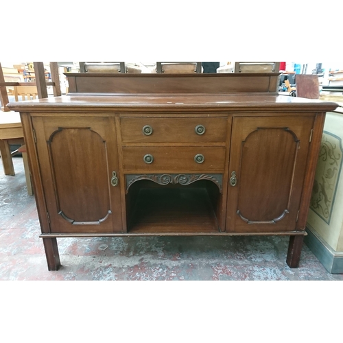 197 - An Edwardian carved mahogany sideboard - approx. 97cm high x 152cm wide x 65cm deep