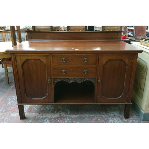 197 - An Edwardian carved mahogany sideboard - approx. 97cm high x 152cm wide x 65cm deep