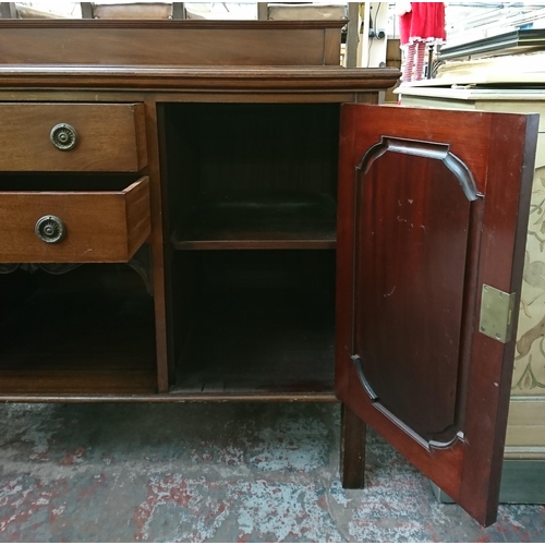 197 - An Edwardian carved mahogany sideboard - approx. 97cm high x 152cm wide x 65cm deep