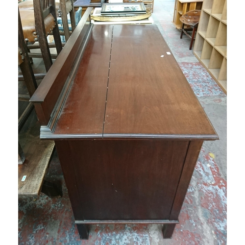 197 - An Edwardian carved mahogany sideboard - approx. 97cm high x 152cm wide x 65cm deep