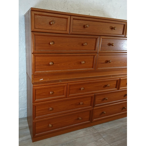 204 - A pair of G Plan teak chests of drawers - approx. 69cm high x 148cm wide x 46cm deep