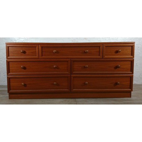 204 - A pair of G Plan teak chests of drawers - approx. 69cm high x 148cm wide x 46cm deep