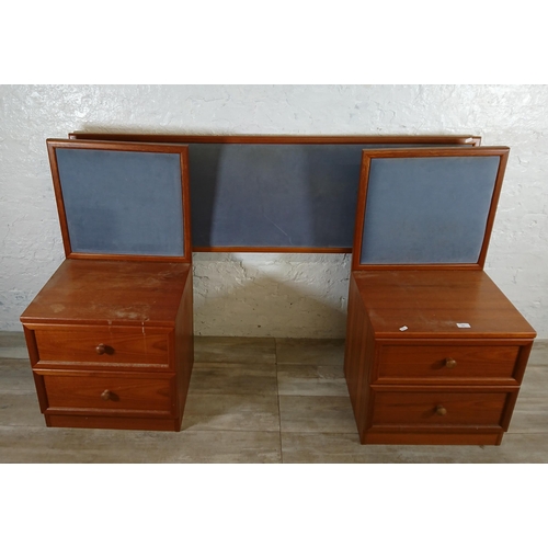 205 - A pair of G Plan teak and blue fabric two drawer bedside cabinets with matching headboard