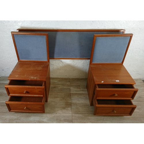 205 - A pair of G Plan teak and blue fabric two drawer bedside cabinets with matching headboard