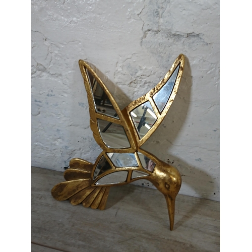 209 - Two pieces of Kare Design home decor, one Hummingbird wall mirror and one Deco Moonfish figurine