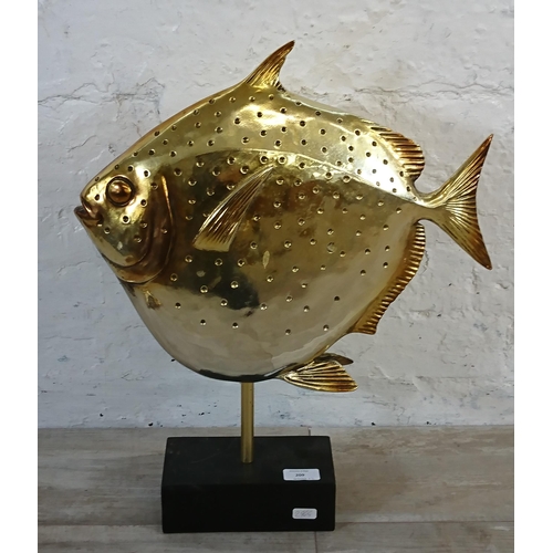 209 - Two pieces of Kare Design home decor, one Hummingbird wall mirror and one Deco Moonfish figurine