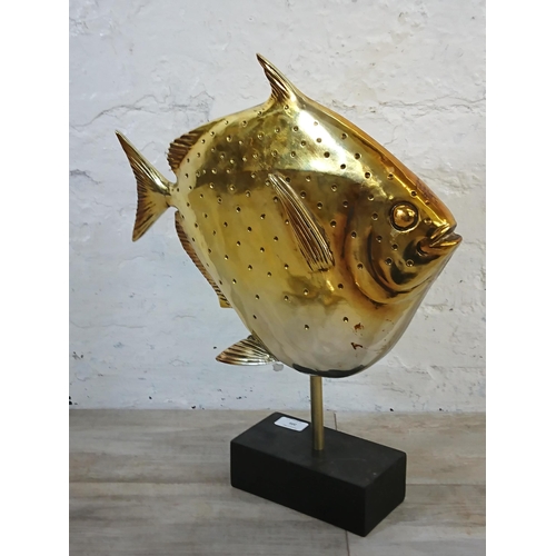 209 - Two pieces of Kare Design home decor, one Hummingbird wall mirror and one Deco Moonfish figurine