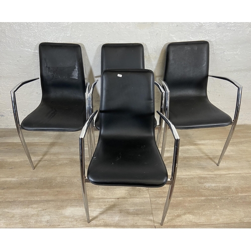 214 - Four Actona of Denmark black vinyl and chrome plated dining chairs