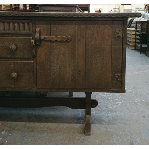 215B - A Nigel Griffiths carved oak sideboard - approx. 76cm high x 168cm wide x 46cm deep