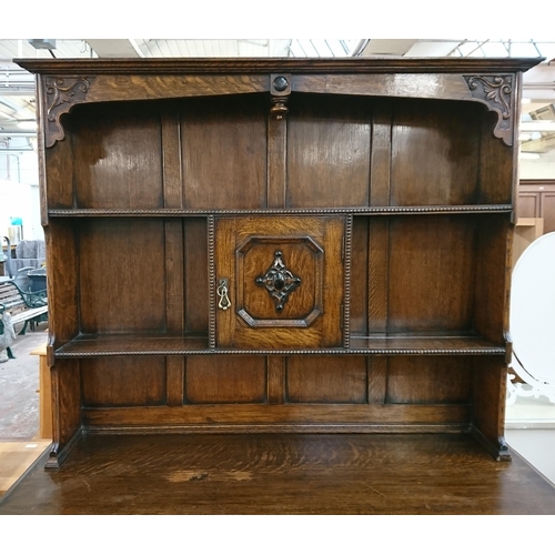 217 - An early 20th century carved oak dresser on barley twist supports - approx. 185cm high x 122cm wide ... 