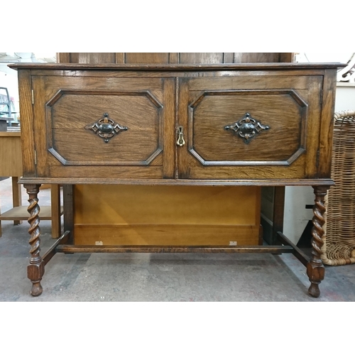 217 - An early 20th century carved oak dresser on barley twist supports - approx. 185cm high x 122cm wide ... 