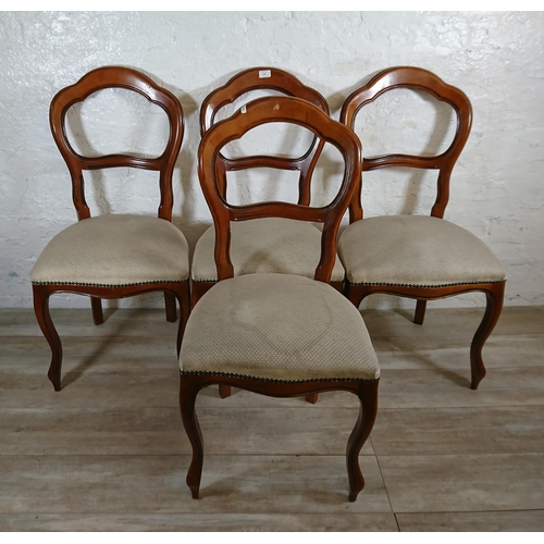 229 - Four Victorian style beech balloon back dining chairs