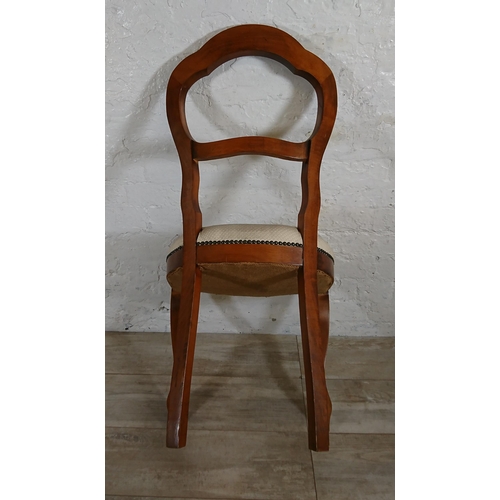 229 - Four Victorian style beech balloon back dining chairs