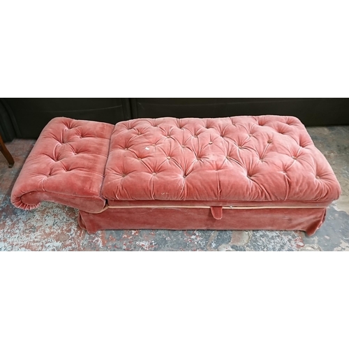 238 - An early 20th century pink buttoned fabric upholstered drop arm chaiselongue/ottoman - approx. 74cm ... 