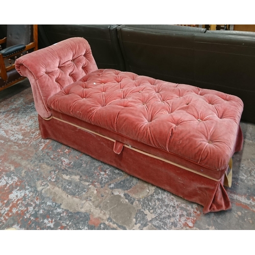 238 - An early 20th century pink buttoned fabric upholstered drop arm chaiselongue/ottoman - approx. 74cm ... 