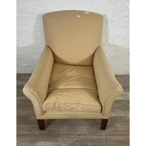 239 - A mid 20th century W. H. Barlow Huyton Quarry fabric upholstered and beech armchair