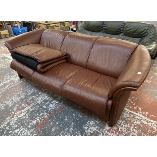 242B - An Ekornes stressless cognac brown leather and beech three seater sofa with new seat cushion