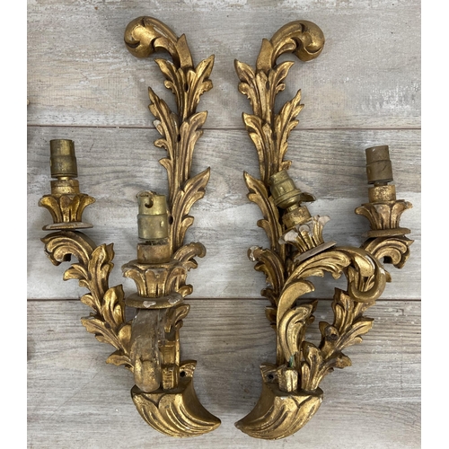 243 - Six Rococo style wall sconces, four gilt metal and two gilt wood