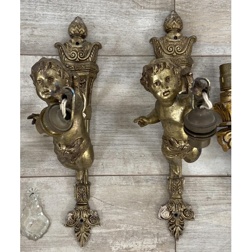 243 - Six Rococo style wall sconces, four gilt metal and two gilt wood