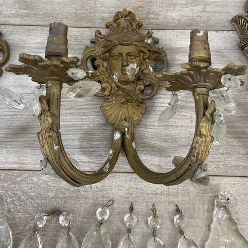 243 - Six Rococo style wall sconces, four gilt metal and two gilt wood