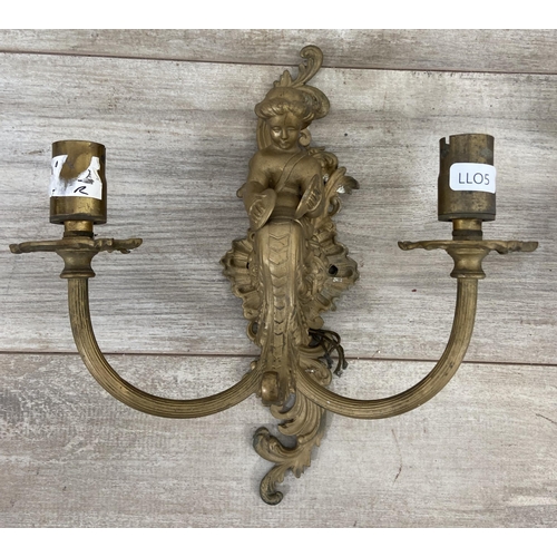 244 - Two pairs of Rococo style gilt metal wall sconces