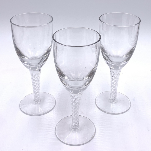 358 - Three Georgian style glass double helix stemmed drinking glasses - approx. 18cm high